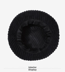 Interior view showing reinforced sweatband and lining of black corduroy bucket hat