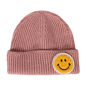Pink ribbed knit beanie featuring a yellow embroidered smiley face patch for winter