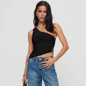 Detail of black one-shoulder top with metallic ring accent and slim fit design