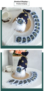 Close-up of handmade Pisces gnome with blue knitted hat and gold stars for home decor