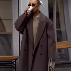 Classic double-breasted long wool coat in deep brown with a stylish oversized silhouette