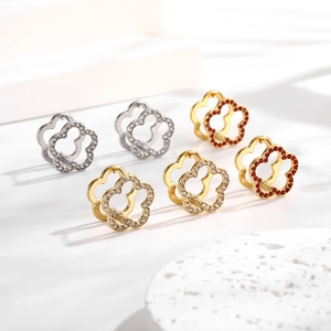 Minimalist double-layered hollow heart and plum flower hoop earrings with zircon inlays