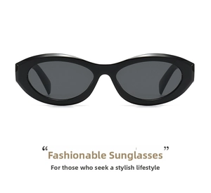 Detail view of oval cat-eye sunglasses with thick black frames and dark grey lenses