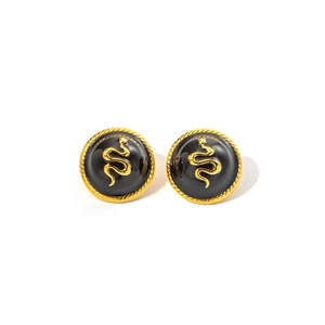 Boucles d'oreilles rondes serpent noir et or avec bordure torsadée et design rétro