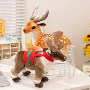 Cute plush reindeer and spotted deer stuffed toys in a cozy home setting