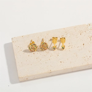 Gold-plated rose and arrow earring set with multi-colored cubic zirconia on stone base