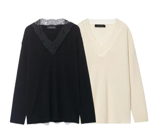 Detail of V-neckline with delicate eyelash lace trim on wool blend knit sweaters