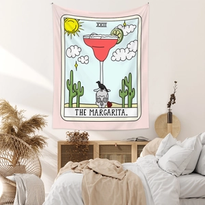 Detail of The Margarita tarot tapestry showing cactus, skull, and crow on soft pink wall
