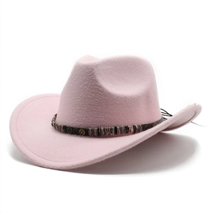 Close-up of pink felt cowboy hat featuring vintage woven band with metal buckles