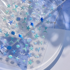 Autocollants 3D pour ongles thème océan avec motifs irisés d'étoiles de mer et de coquillages