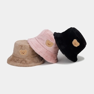 Plush winter bucket hats with cute bear embroidery in brown, pink, and black colors