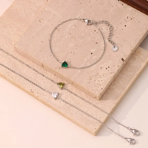 Minimalist silver stainless steel bracelet with heart and triangle zircon pendants