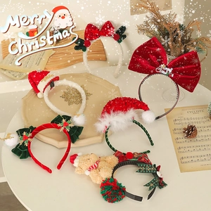 Christmas headband set with glitter antlers and Santa hats for festive holiday party dress up