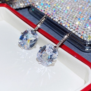 Detail of square cushion cut cubic zirconia earrings with micro-pave ear hooks