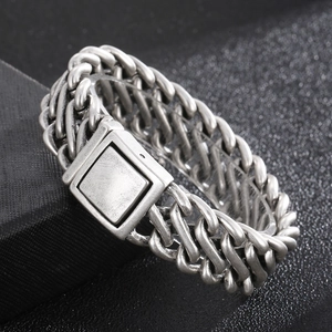 Vintage stainless steel heavy weave chain bracelet with square buckle on black background
