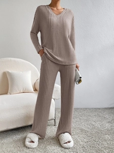 Detail of grey-purple ribbed knit V-neck loungewear set with soft vertical texture