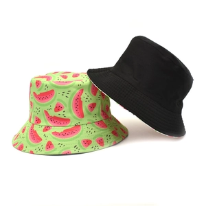 Reversible bucket hat with watermelon print and solid black design for sun protection