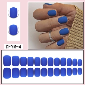 Detail view of 24 pieces matte blue short square press-on nails with sizing scale