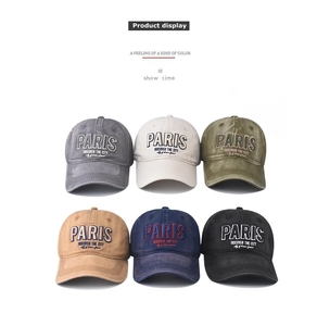 Detailed view of PARIS embroidery and washed cotton textures on six various baseball caps