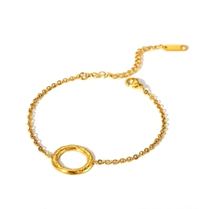 Golden titanium steel necklace with a hammered round pendant and minimalist cable chain