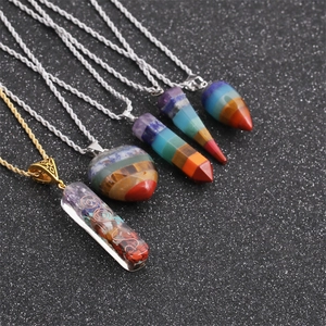 Rainbow crystal pendants in heart and bullet shapes with silver and gold rope chains