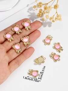 Detailed view of alloy bow bear pendants for DIY jewelry making showing 1.3x1.8cm size