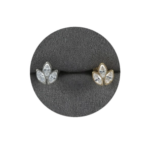 Titanium labret studs with marquise-cut zircons in silver and gold flower shapes