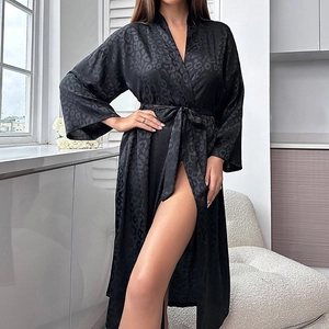 Elegant black leopard print satin bathrobe with belted waist for a minimalist home look
