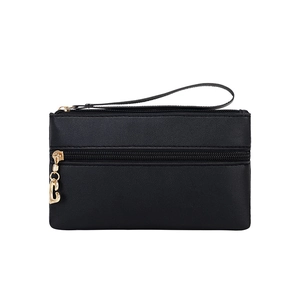 Classic black PU leather clutch bag with dual zippers and gold heart-shaped charm accessory