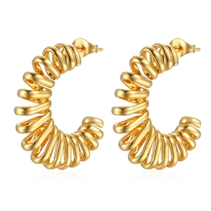 Boucles d'oreilles créoles dorées en acier inoxydable en forme de C spirale ressort