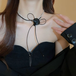 Elegant double-layer choker with black fabric rose, ribbon bow, and black-white beads