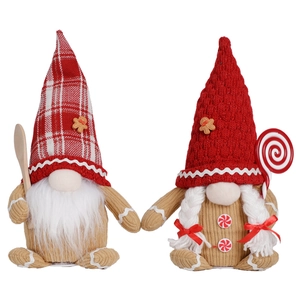 Detailed view of gingerbread themed Christmas gnomes with knit textures and festive candy decor