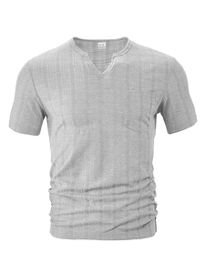 Detail of grey V-neck sports t-shirt showing chest pocket and 100% polyester fabric texture