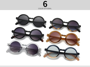 Flat lay view of retro round sunglasses showing six diverse frame color options in high detail