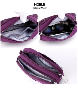 Macro view of multi-compartment purple nylon bag showing three zippered sections for storage