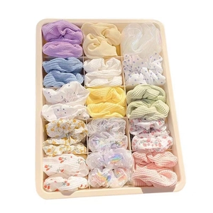 Organza and cotton scrunchie set in a 15-grid storage box with pastel colors