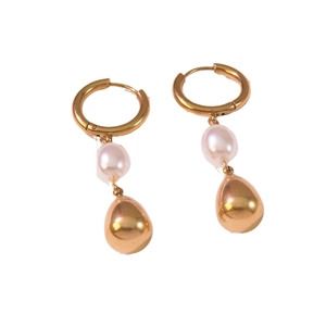 Gold teardrop earrings featuring white pearls and polished stainless steel hoop closure
