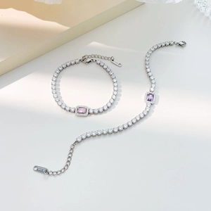 Elegant stainless steel tennis bracelet with sparkling pink and purple cubic zirconia stones