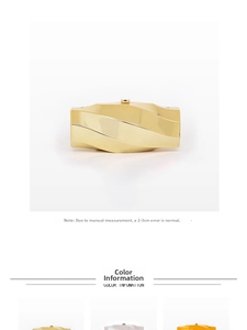 Detail of gold evening clutch bag with ripple texture and metallic clasp finish