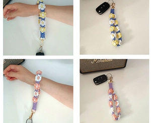 Detailed views of handmade braided daisy wrist straps in blue and purple color options