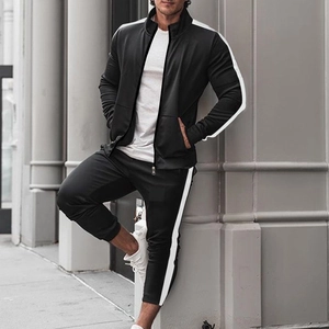 Men's black tracksuit with white side stripes featuring a zip-up stand collar jacket