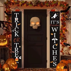 Halloween Trick or Treat porch banners with ghosts and bats hanging on front door