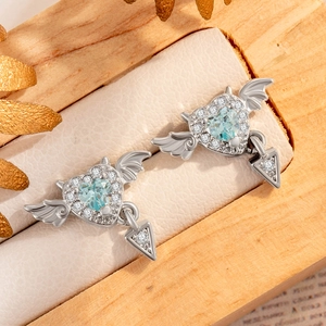 Silver angel wing heart earrings with blue zircon in a premium jewelry gift display box