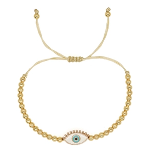 Close-up of evil eye pendant bracelet with 4mm gold beads and adjustable cream cord