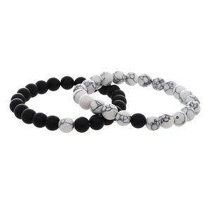 Matching distance bracelets set featuring matte black agate and white turquoise stone beads