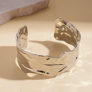 Minimalist silver wavy textured open cuff bracelet with artistic geometric metal design