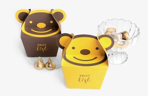 Detail view of cartoon bear folding cookie boxes with Sweet Love print for gifts