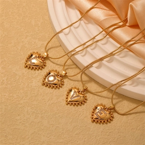 Retro gold heart pendant necklaces set with L-O-V-E letters and sparkling zircons