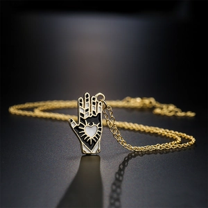 Unique 18K gold plated Hamsa hand pendant necklace with black and white heart enamel inlay