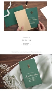 Detailed view of forest green card with premium metal charms and vintage envelopes